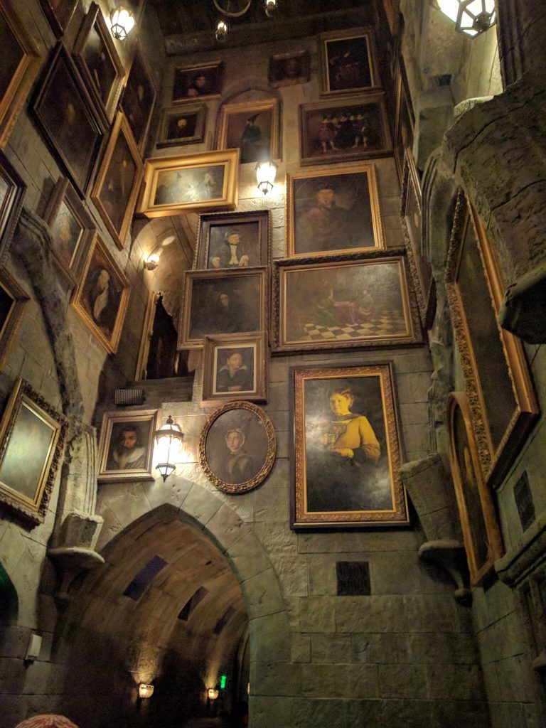 File:Wizarding World of Harry Potter - talking paintings on the