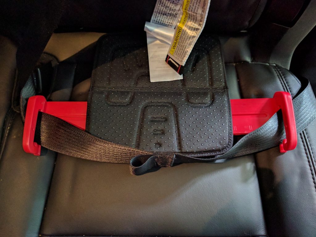 Packing a booster seat for vacation can be frustrating. Find out all about our real life experiences using a MiFold booster seat for travel.