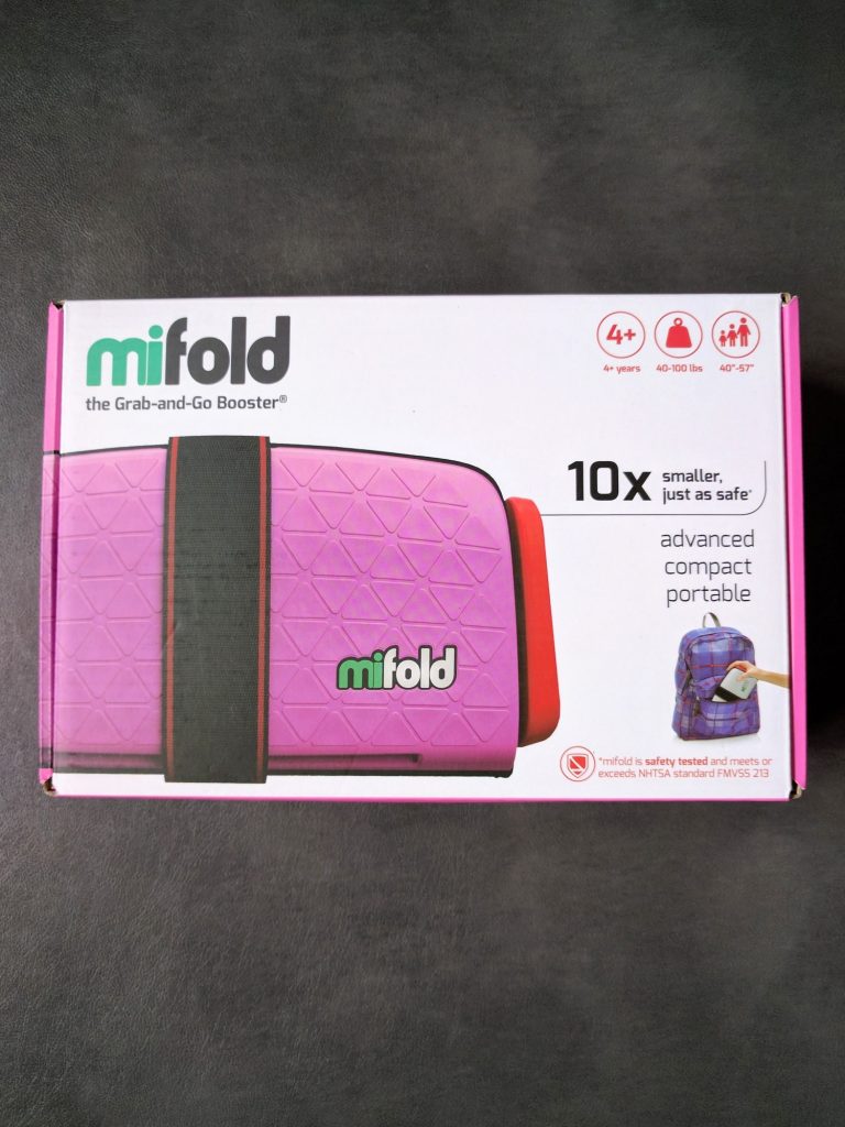 Packing a booster seat for vacation can be frustrating. Find out all about our real life experiences using a MiFold booster seat for travel.