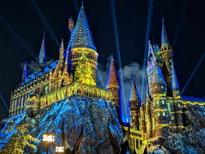 Christmas tree projections light up Hogwarts Castle at Universal's Islands of Adventure