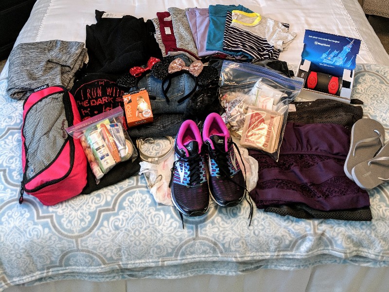 Are you heading to Disney for a short visit? Then I challenge you to pack light for Disney World using my tested tips. They even work for runDisney trips! #rundisney #disneypacking #disneyworld #packing