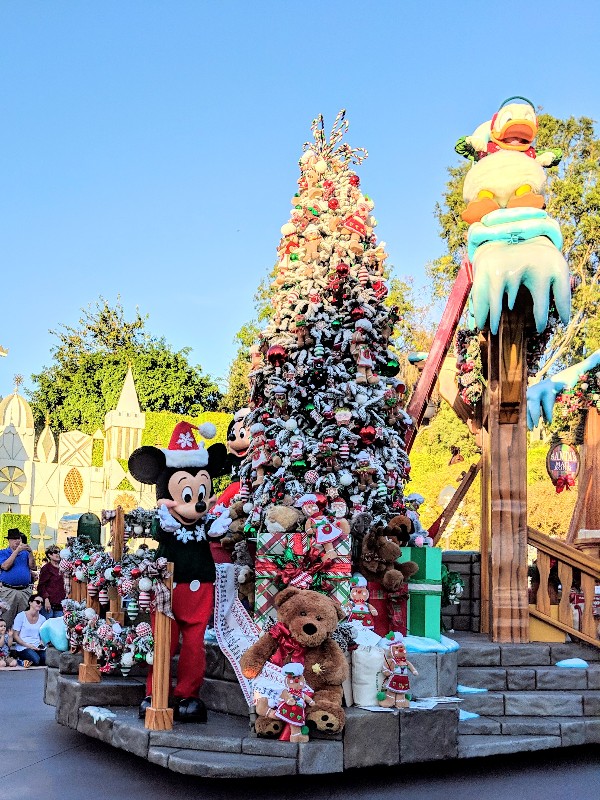 Is visiting Disneyland at Christmas on your wish list? If so, find out what you need to see and what you can skip during the holidays at Disneyland. #disneyland #hauntedmansionholiday #disneylandchristmas #itsasmallworld #disneyvacation