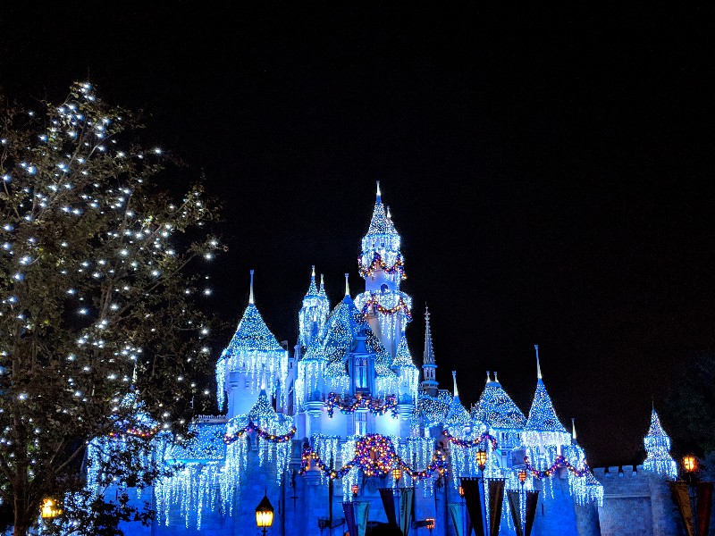 Is visiting Disneyland at Christmas on your wish list? If so, find out what you need to see and what you can skip during the holidays at Disneyland. #disneyland #hauntedmansionholiday #disneylandchristmas #itsasmallworld #disneyvacation