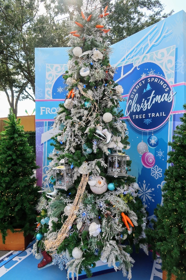 The Disney Springs Christmas Tree Trail at Disney World is a fun and free way to get in the Christmas spirit. Find out more about this seasonal event. #disneysprings #disneyworld #disneychristmas #disney #christmas