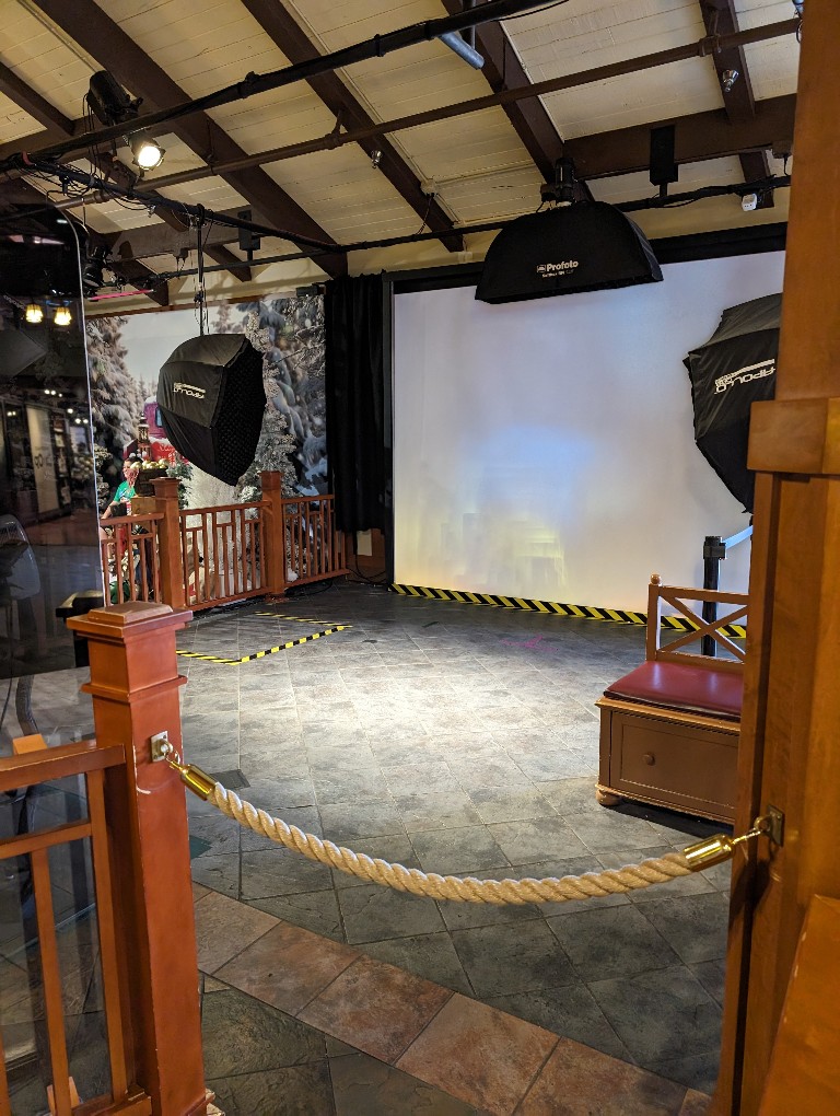 A large green screen with special projectors provides amazing virtual backdrops at Disney PhotoPass Studio