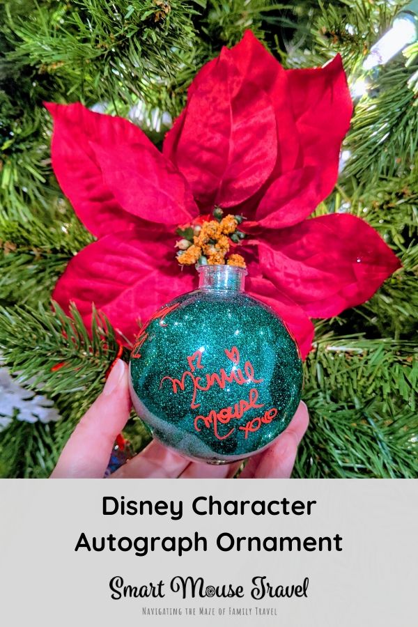 Disney character autographs are a great way to interact with characters. This DIY Disney autograph ornament makes a great souvenir and keepsake. #disneyland #disneyworld #disneycrafts #disneycharacters #disney #christmas
