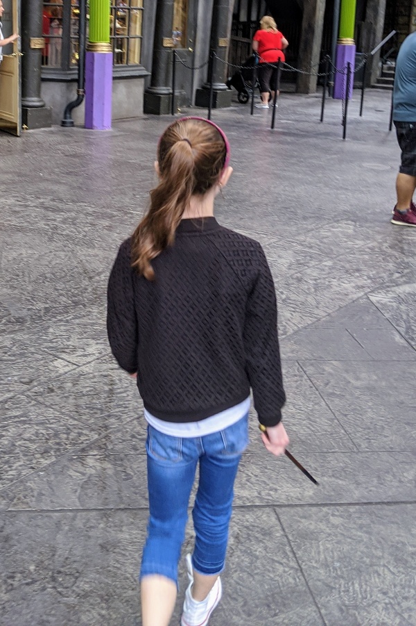 Wizarding World of Harry Potter interactive wands at Universal Orlando give you the chance to perform magic! Here are tips plus two secret spell locations. #wizardingworldofharrypotter #ollivanders #harrypotter #universalorlando