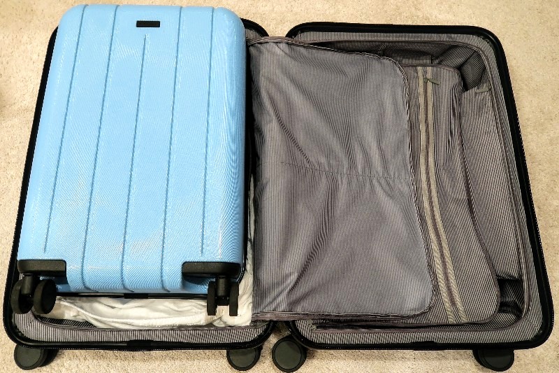 Chester Regula is a new medium-size checked bag offering from the brand that made our favorite carry-on. See if the Regula is now my checked bag of choice. #luggage #bestluggage #traveltips #familytravel #travelgear