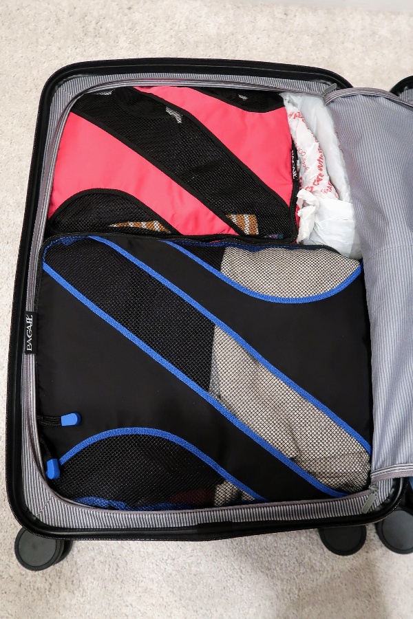 Chester Regula is a new medium-size checked bag offering from the brand that made our favorite carry-on. See if the Regula is now my checked bag of choice. #luggage #bestluggage #traveltips #familytravel #travelgear