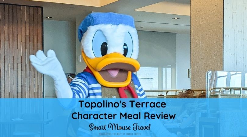 Donald Duck waves to guests. Topolino's Terrace Breakfast à la Art with Mickey & Friends is a good way to see classic characters with a delicious meal at Disney World.