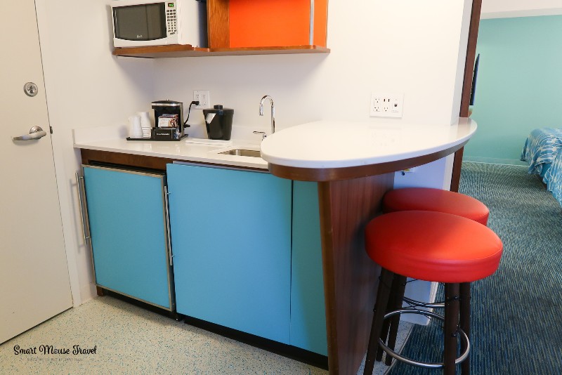 Cabana Bay Beach Resort Family Suite kitchenette with mini fridge and microwave.