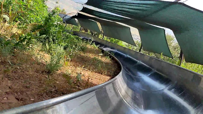 Canopy shading metal alpine slide at Utah Olympic Park.