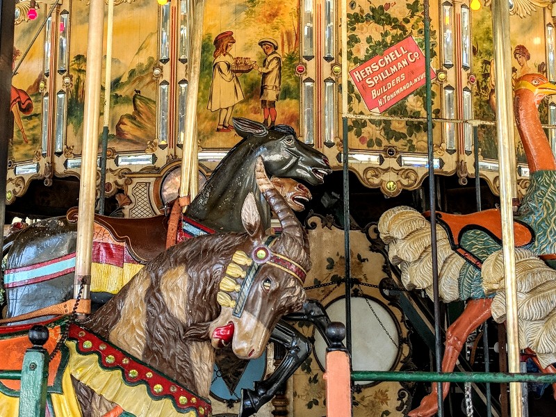 Old fashioned carousel with original wooden animals is perfect when visiting Balboa Park with kids