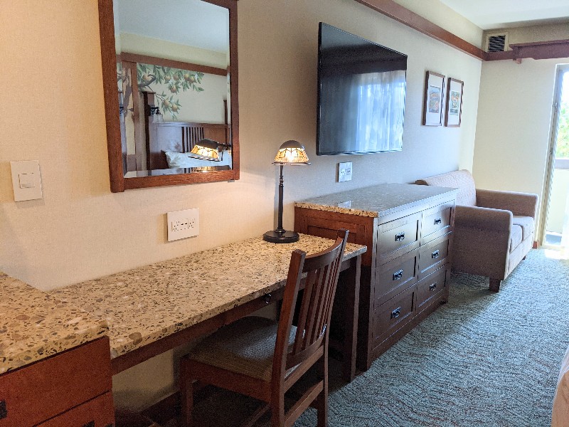 Disney's Grand Californian large dresser and desk with granite style tops and warm wood tones.