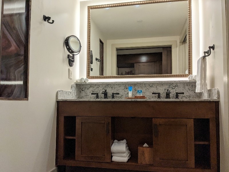 Double sinks below a large mirror at Disney's Wilderness Lodge