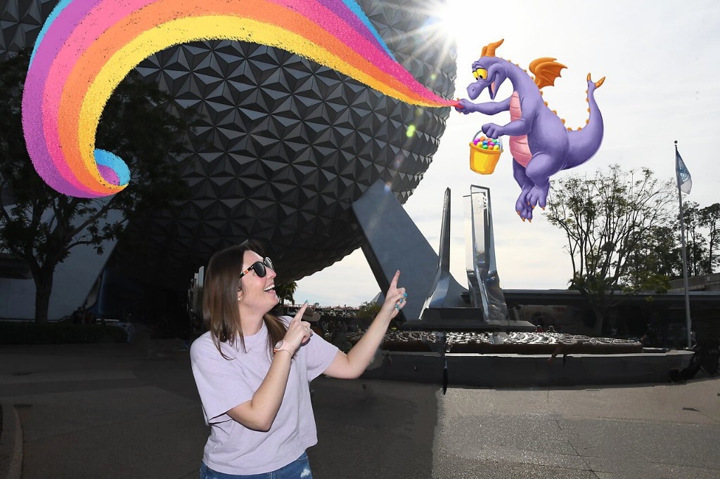 A woman points towards Figment floating in front of Spaceship Earth during Epcot Festival of the Arts