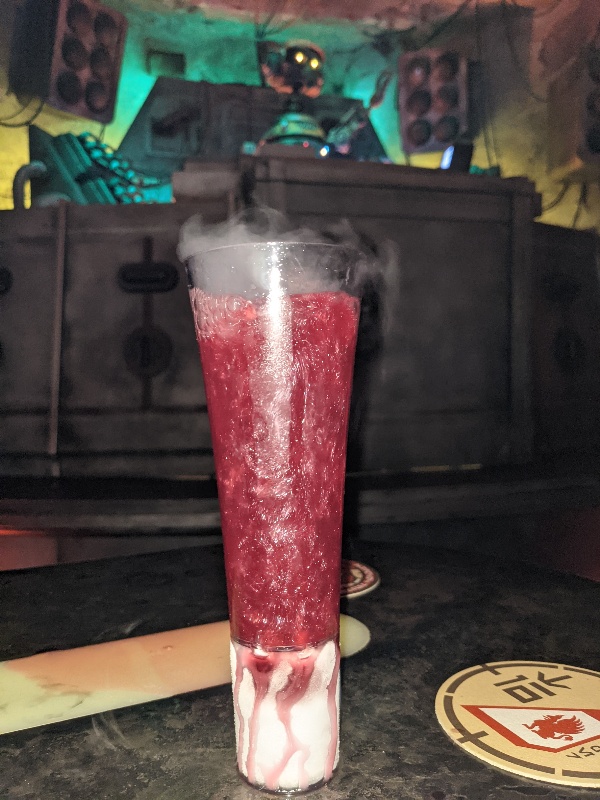 Red drink bubbles with edible glitter at Oga's Cantina