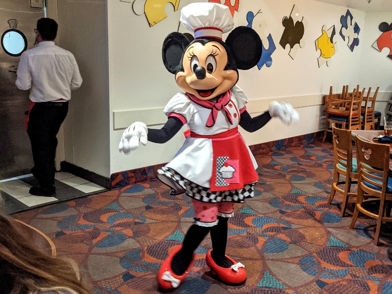 Minnie Mouse poses in her adorable chef inspired outfit