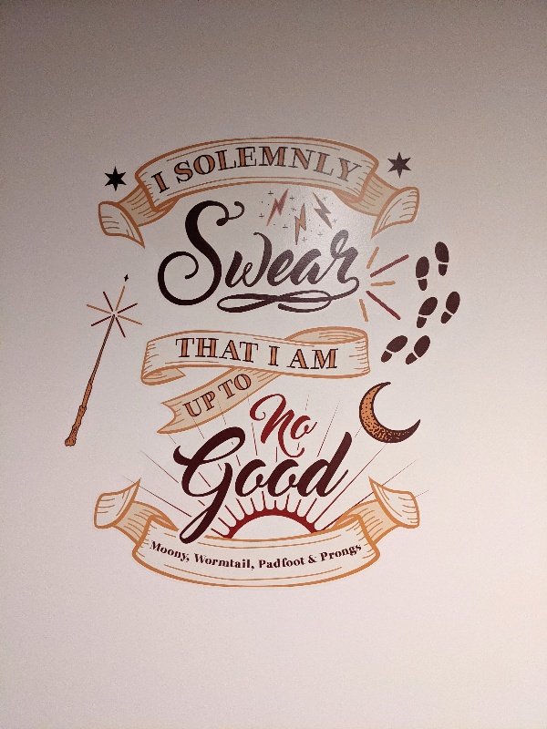 "I solemly swear that I am up to no good" quote decal on wall