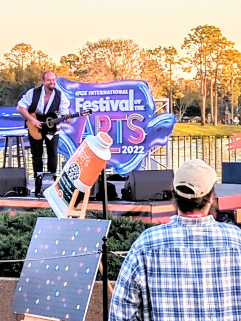 A musician performs at World Showcase Plaza