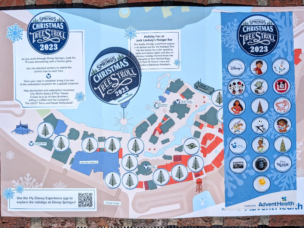 Map of the 2023 Disney Springs Christmas Tree Stroll locations with colorful stickers representing each tree.