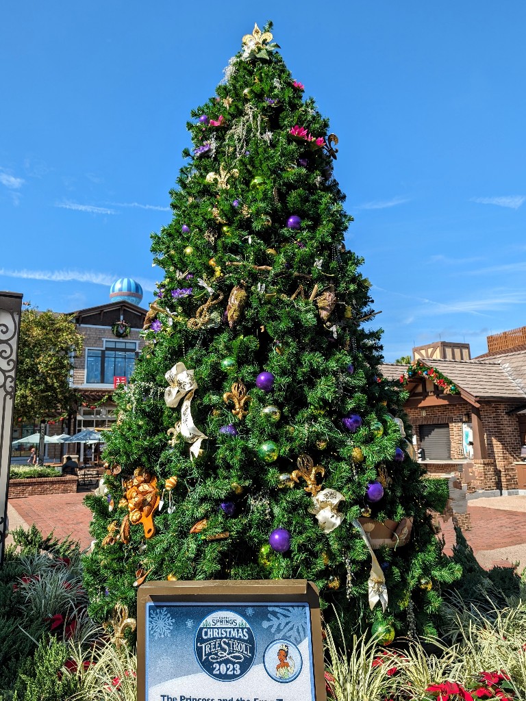 The Princess and The Frog tree features lots of green, purple, and golds plus instruments and some royal frog decorations