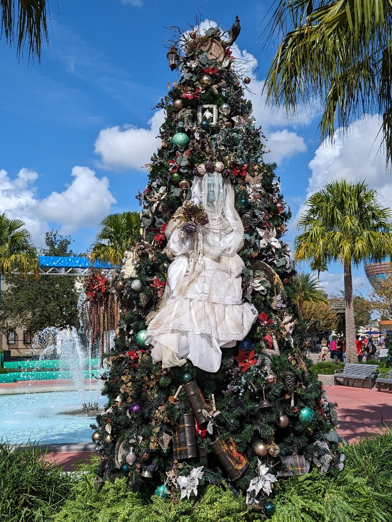 The Haunted Mansion tree features many spooky elements from the ride including a large Constance in her wedding gown