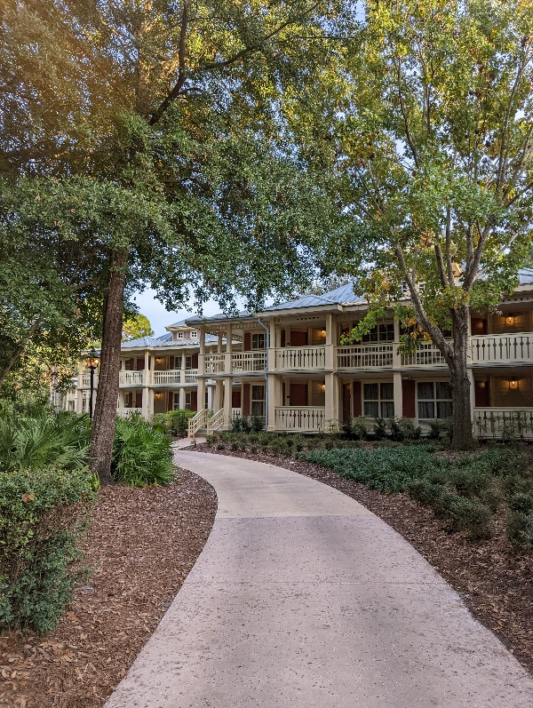 Winding tree covered walkways connect the sprawling Port Orleans Riverside resort buildings