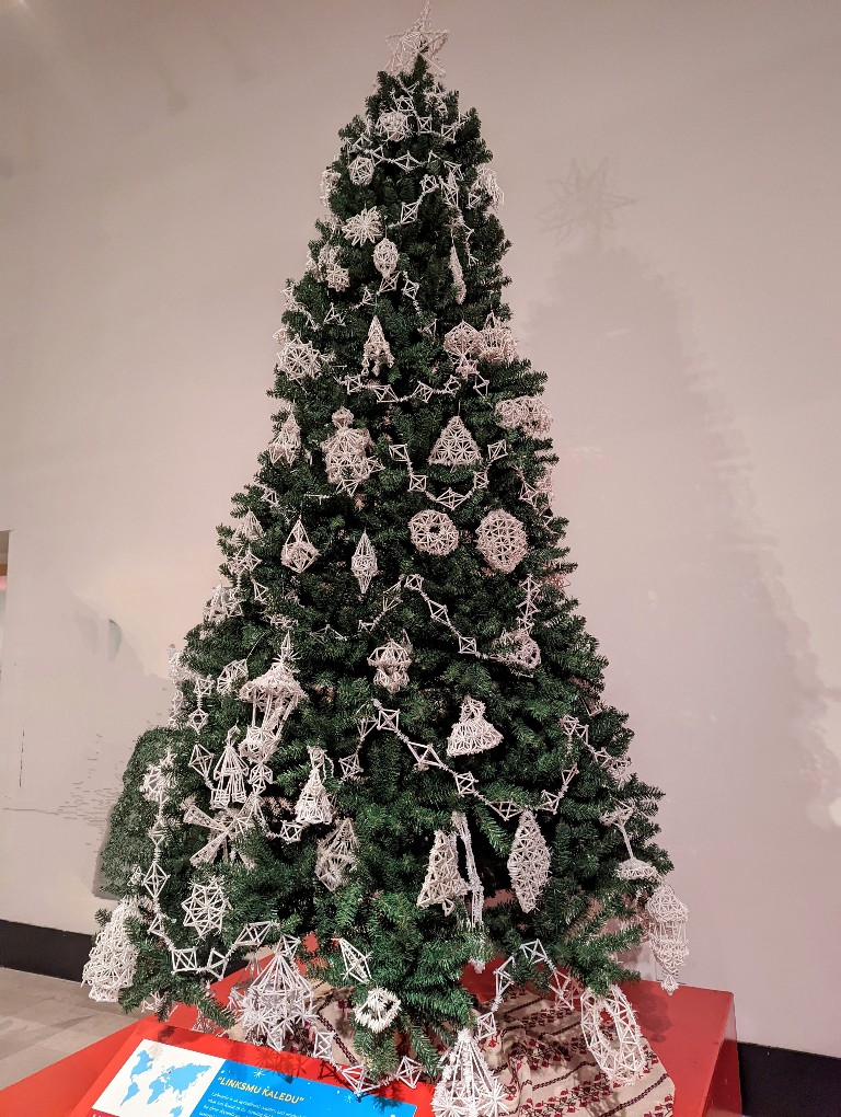 Lithuania Christmas tree covered in woven straw ornaments