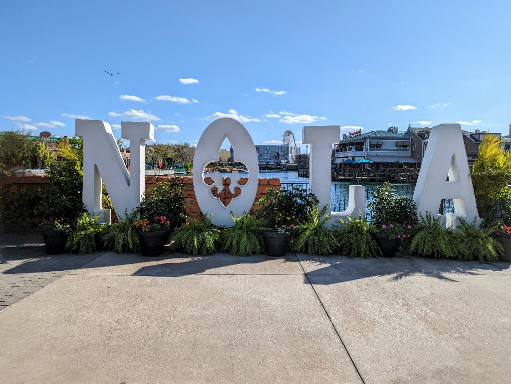 A life size NOLA sign makes a great photo spot for Universal Mardi Gras