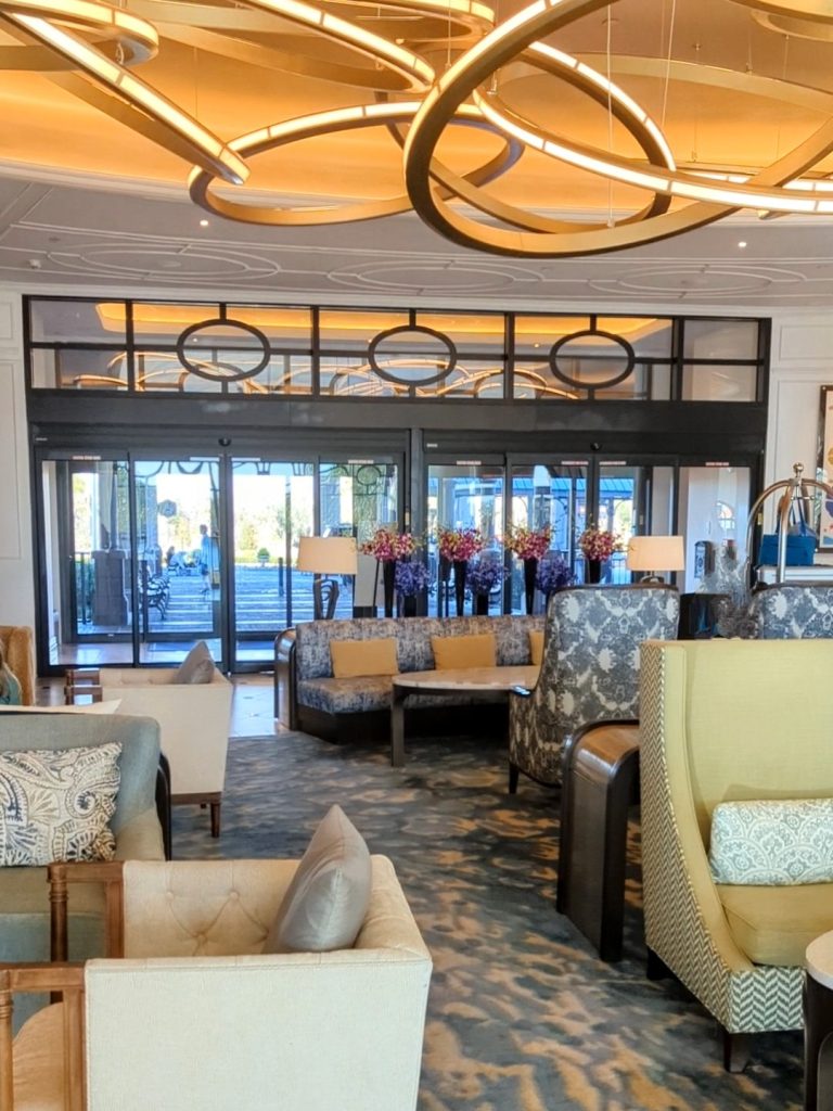 An elegant lobby welcomes guests to Disney's Riviera Resort