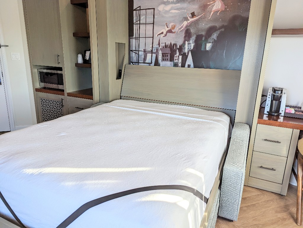 The pull down bed reveals hidden charging stations and adorable Peter Pan inspired art