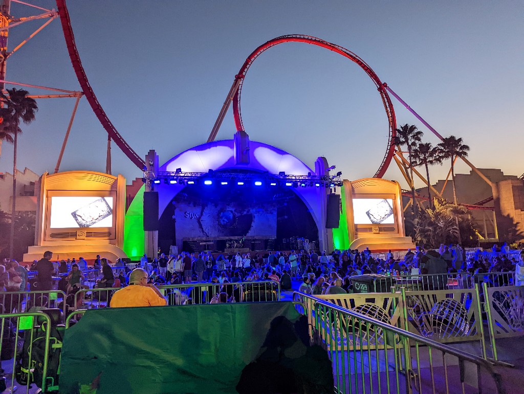 Universal Mardi Gras concert stage in front of Rip Ride Rockit