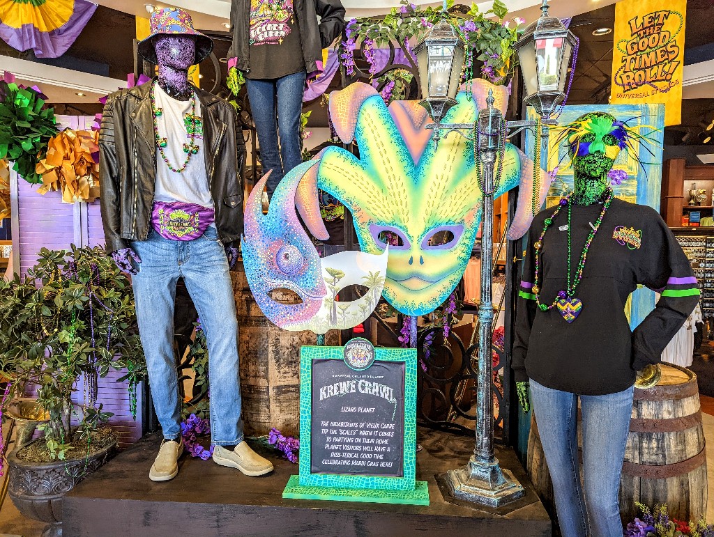 Krewe Crawl lizard theme Mardi Gras masks enhance a merchandise display at Universal Studios Florida