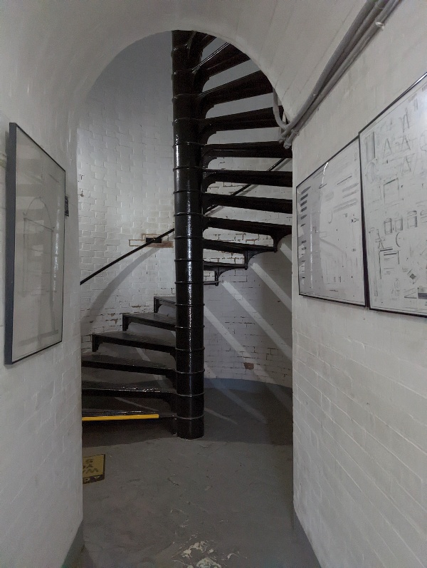 Metal winding staircase leads to the Tybee Island Light Station catwalk