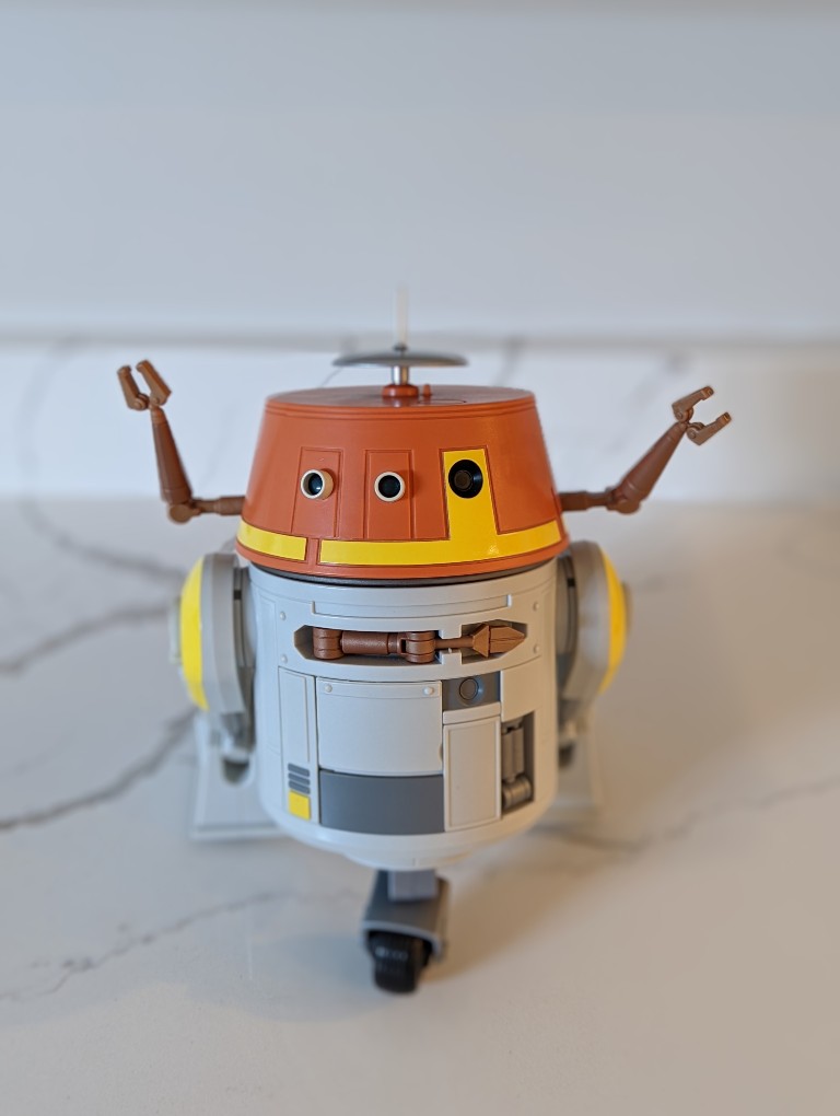 C series astromech with arms extended looks like Chopper from Star Wars Rebels