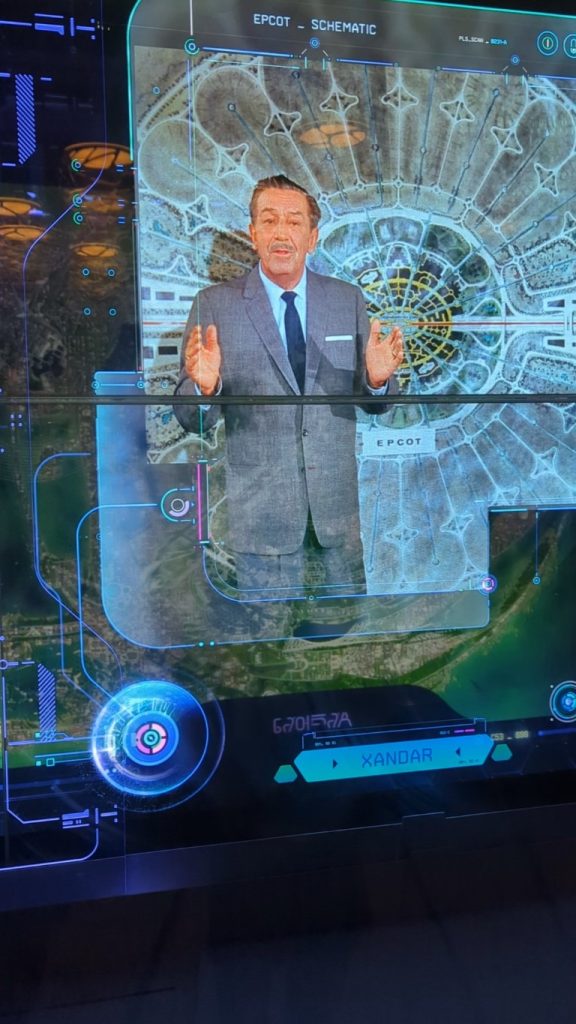 Walt Disney presenting his plans for EPCOT are tied into the Xandar technology displays in the Cosmic Rewind queue