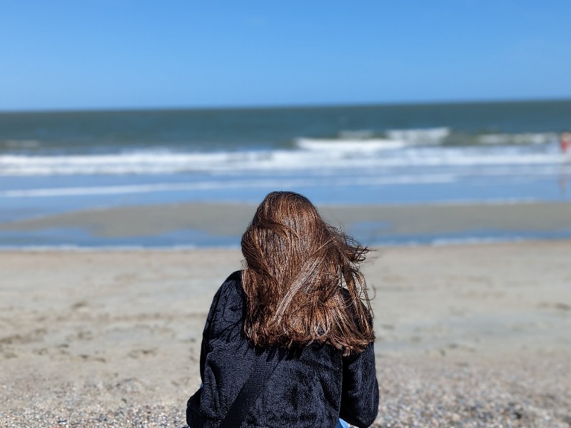 A girl looks for shells on Tybee Island