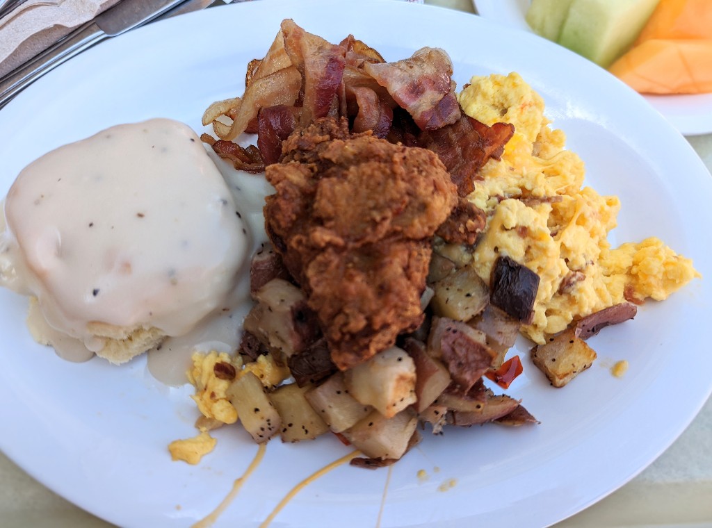 Biscuits and gravy, fried chicken, breakfast potatoes, and scrambled eggs are just some of the options at Plaza Inn breakfast with Minnie and Friends