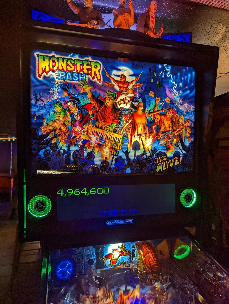 Monster Bash pinball machine lit up at Asheville Pinball Museum