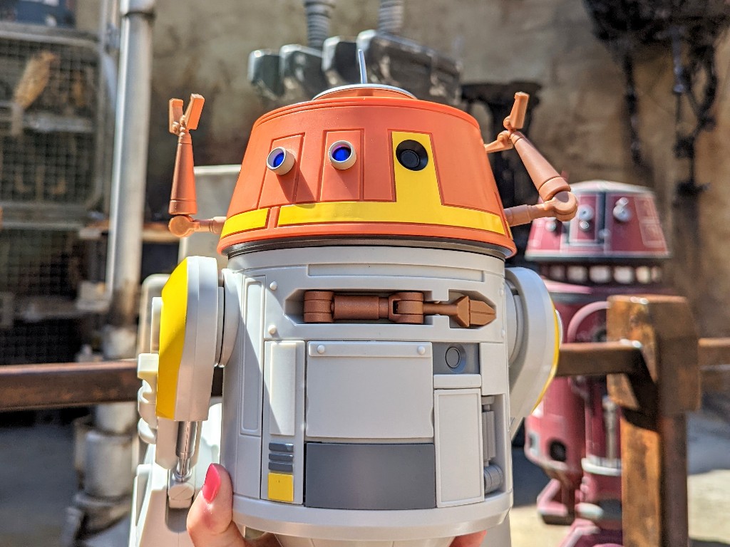 A C-series droid poses in Disneyland Galaxy's Edge