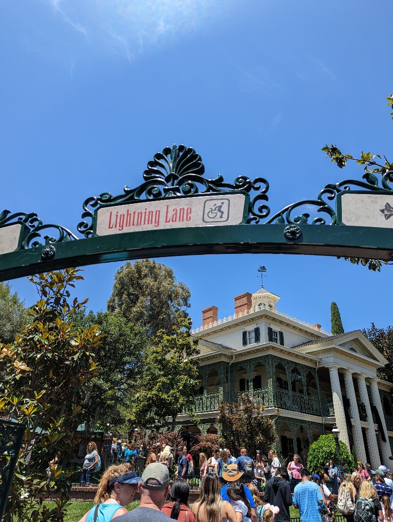 Disneyland Genie Plus Lightning Lane entrance at Haunted Mansion