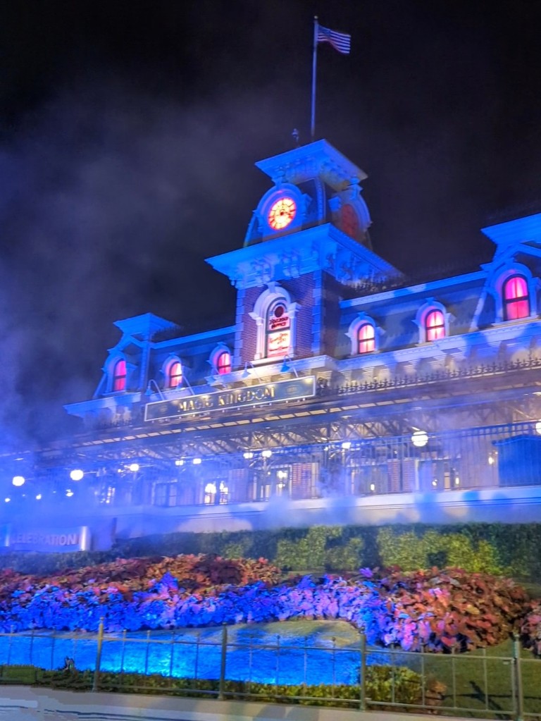 Fog drifts in front of Magic Kingdom train station as guests exit MNSSHP