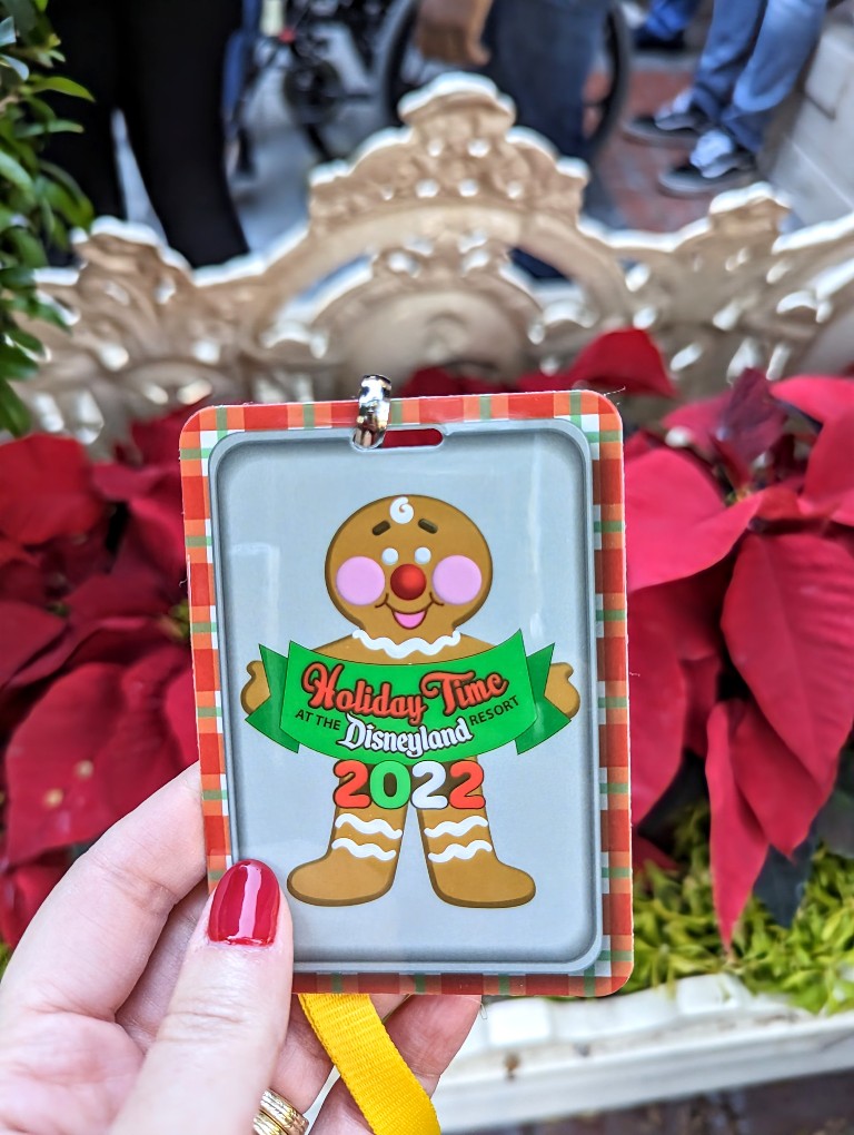 Holiday Time at the Disneyland Resort lanyard with a plaid border and center gingerbread man helps tour guides keep track of the group