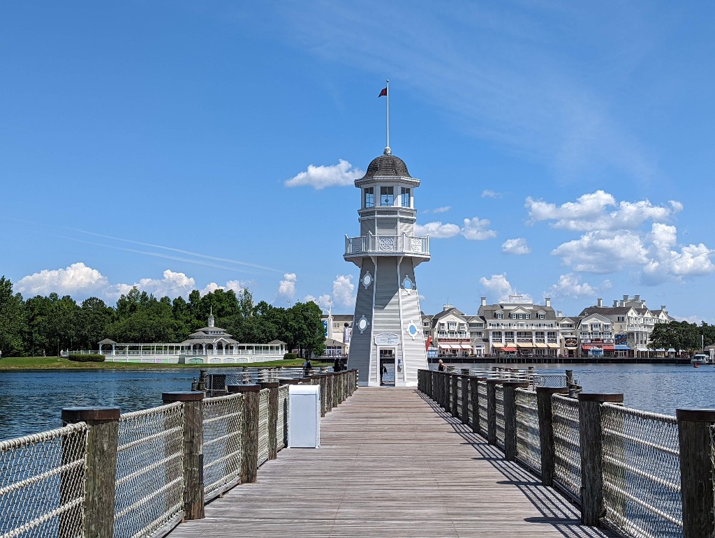 Use this gray and white lighthouse to find Disney's Yacht Club boat dock behind the resort.