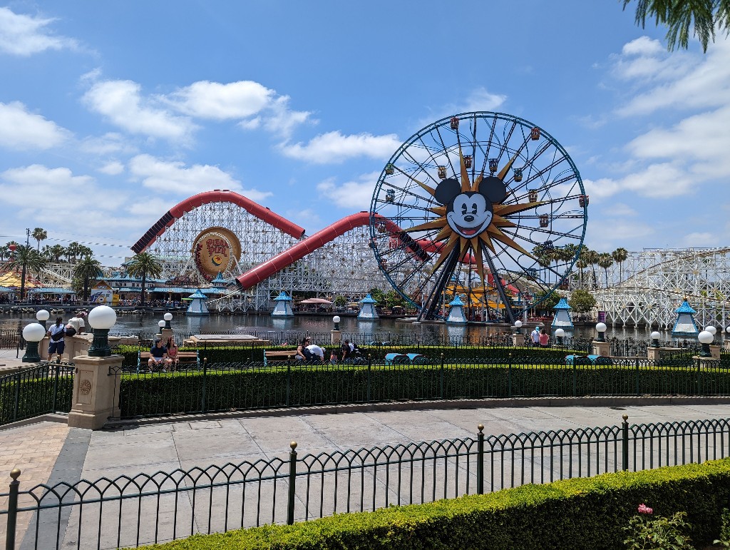 Incredicoaster and Pixar Pal-A-Round in the background of Paradise Gardens Park which turns into the World of Color viewing area at night