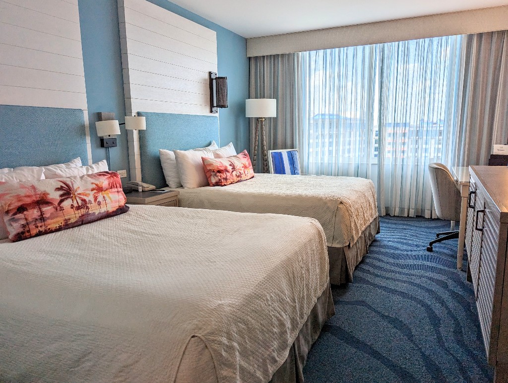 Soft blue and crisp white decor dominates the Sapphire Falls 2 queen room at Universal Orlando