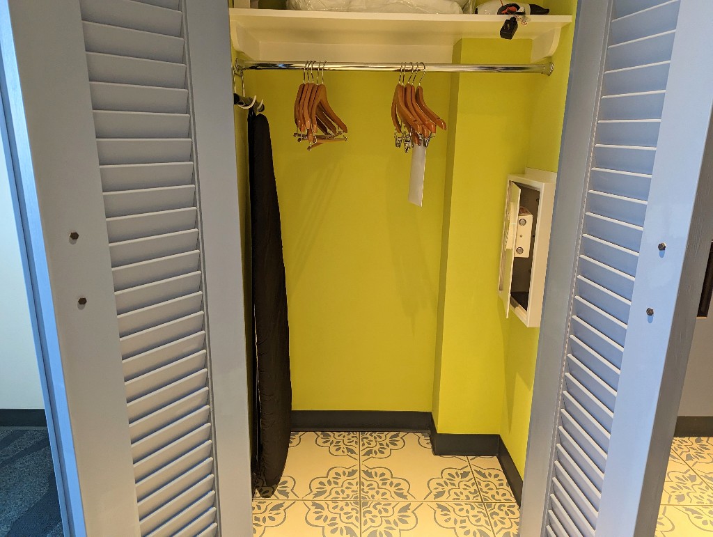 Bright green paint livens up the basic Sapphire Falls closet