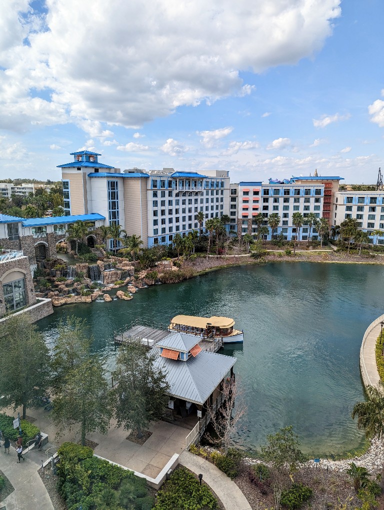 View of the Sapphire Falls lagoon, waterfall, and water taxi dock all visible from our Sapphire Falls 2 queen lagoon view room