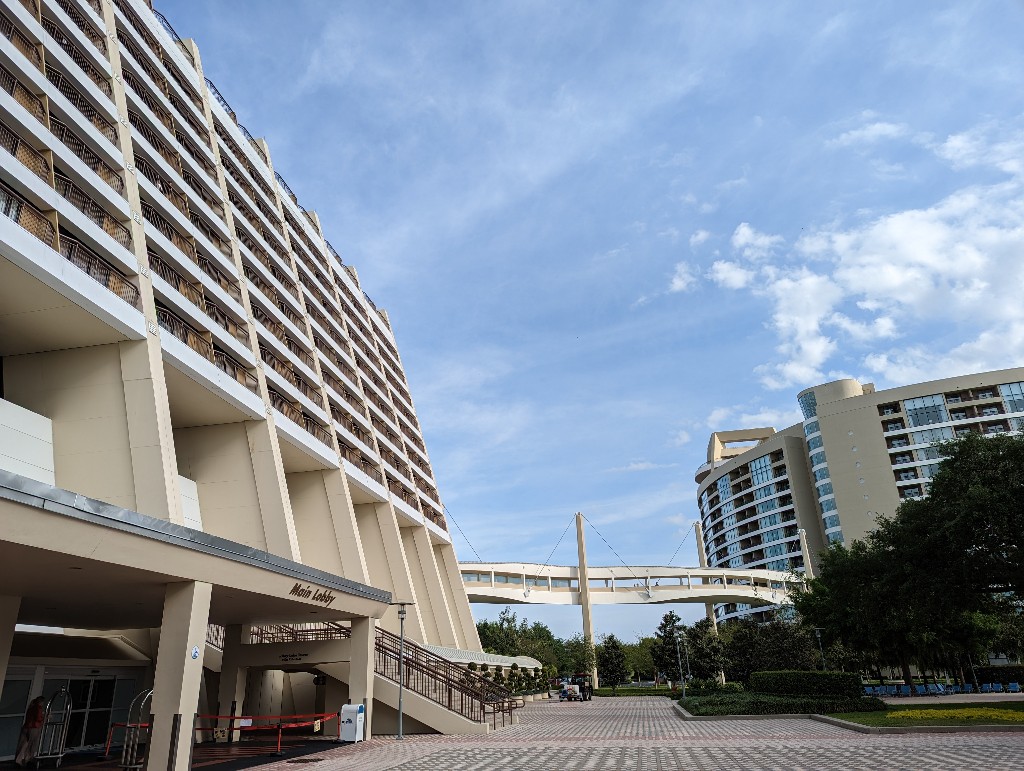 Outside view of Disney's Contemporary Main Tower building with elevated walkway to Bay Lake Tower